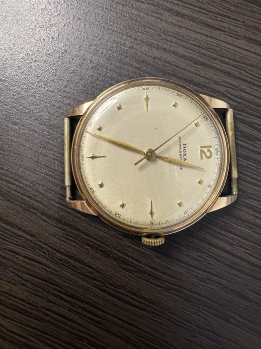 Złoty zegarek Doxa 5277,906  14k 29,15 gr. 585