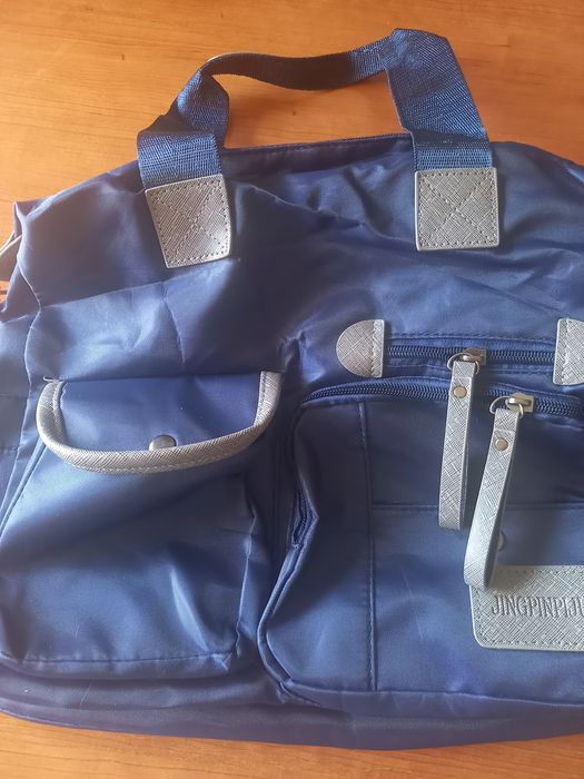 Mala multiusos com varias bolsas