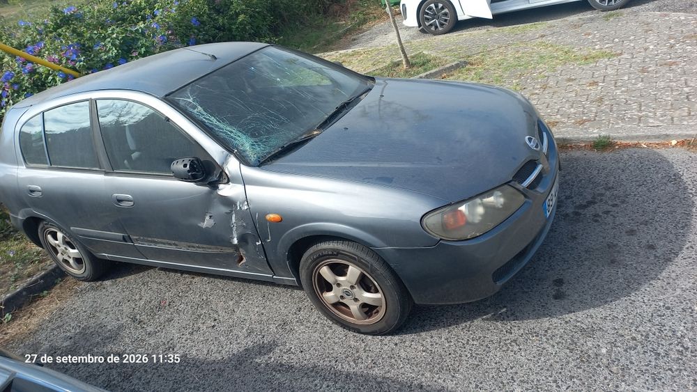 Nissan almera 2002 — photo 2