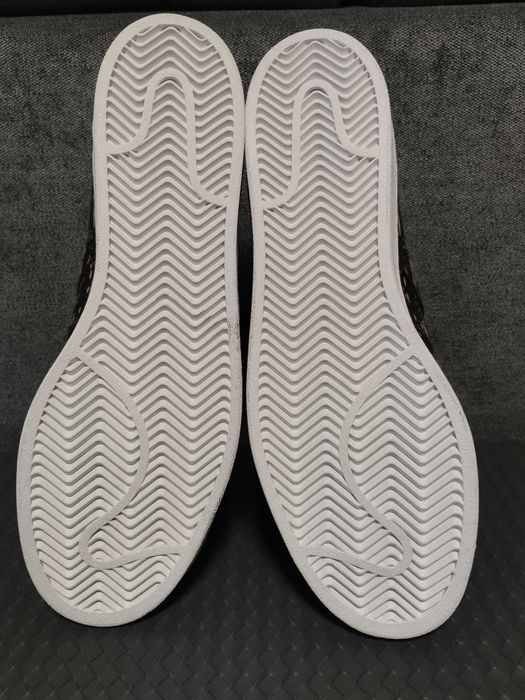 Adidas Superstar metallic foil gold.