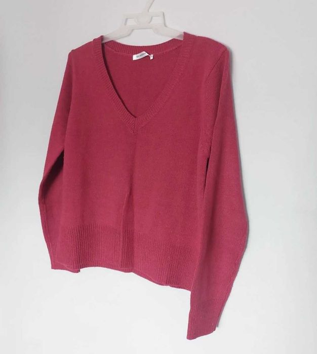 Różowy sweter