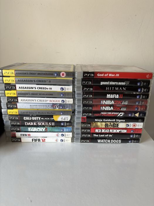 PS3 Slim + 24 jogos