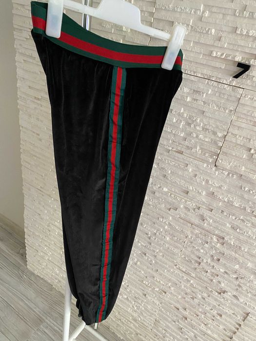 Rezerwacja Joggery spodnie dresowe welurowe z lampasami paski