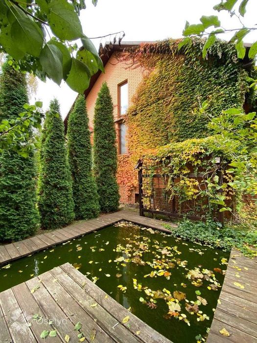 Затишний будинок з власним озером у с. Гатне 5 хв до метро Теремки