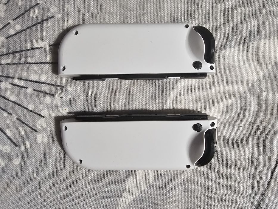 Nintendo Switch 2x JoyCon + stacja ładująca