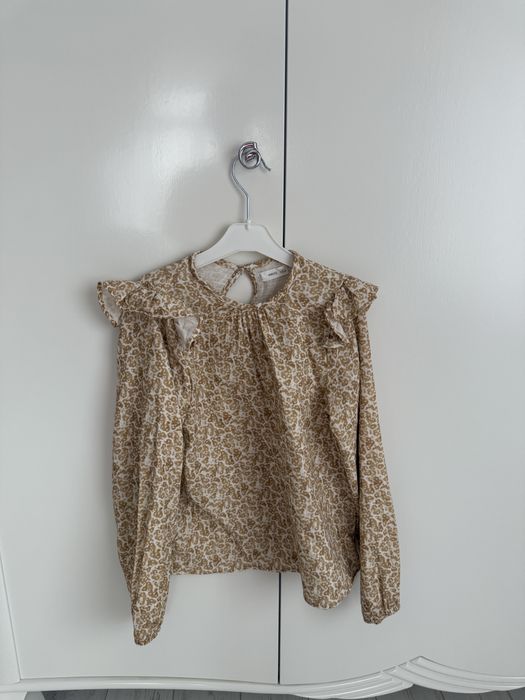 Ніжна жіноча блуза