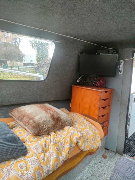 Łódź kabinowa z silnikiem i przyczepą