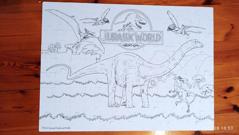 Puzzle z dinozaurami dwustronne 108 elementów Jurassic World