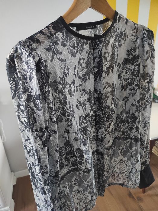 Śliczna bluzka Reserved 38