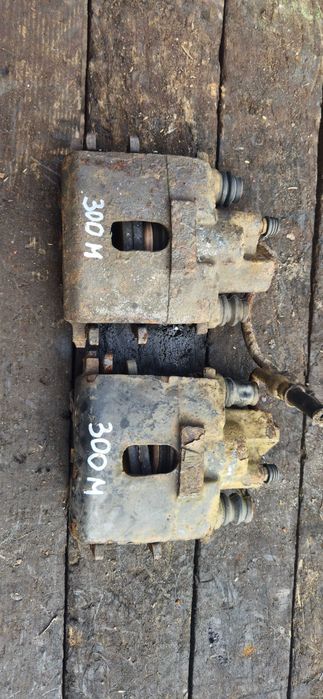 Zaciski zacisk hamulcowy tył prawy lewy Chrysler 300M KOMPLET