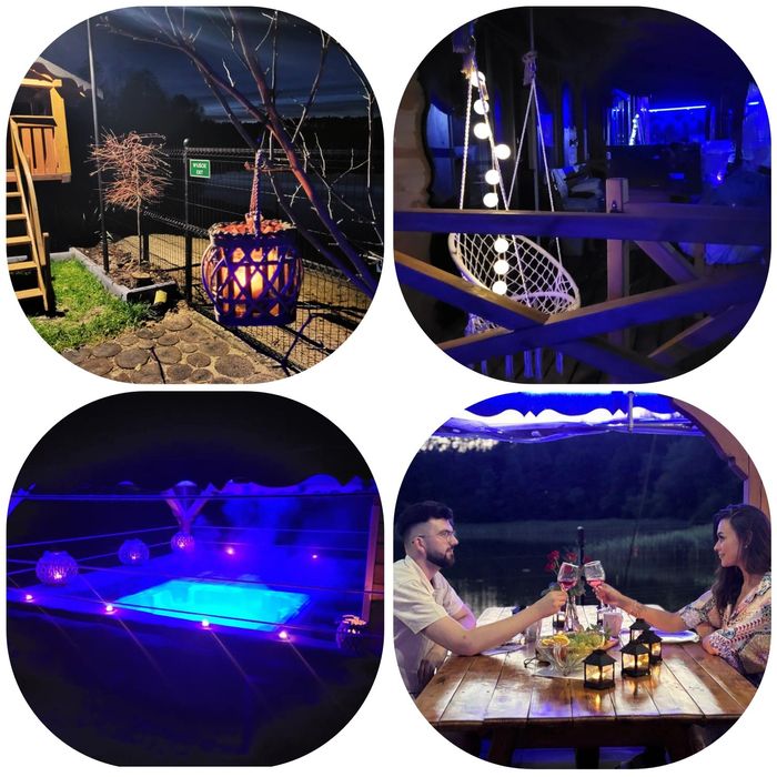 Domek nad jeziorem z jacuzzi, sauną i strefą masażu .