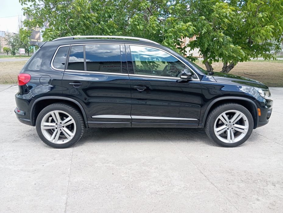 Volkswagen Tiguan 2014 VIN WVGAV7AX4FW009831 фото оголошення 4 з 24