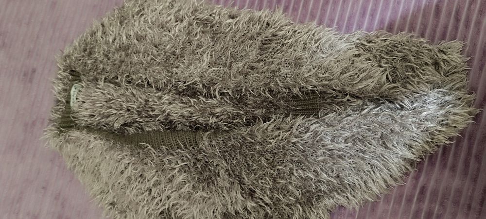 Colete de pelo sem botões . Usado