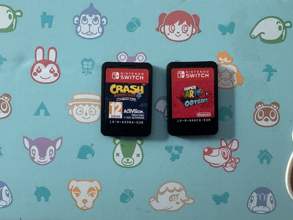 Nintendo Switch Lite Rosa (Como Nova) + 2 Jogos (Mario + Crash) + Capa