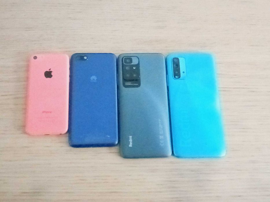 Lote 4 telemóveis avariados para peças (iPhone, Huawei, Redmi)