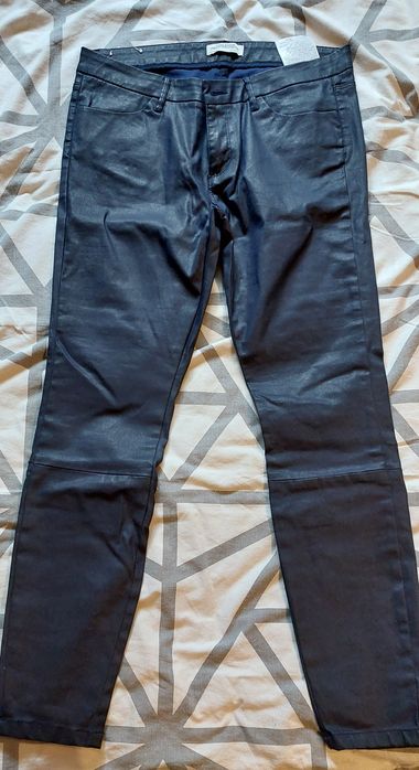 Spodnie. Paczka ubrań spodnie i bluzki