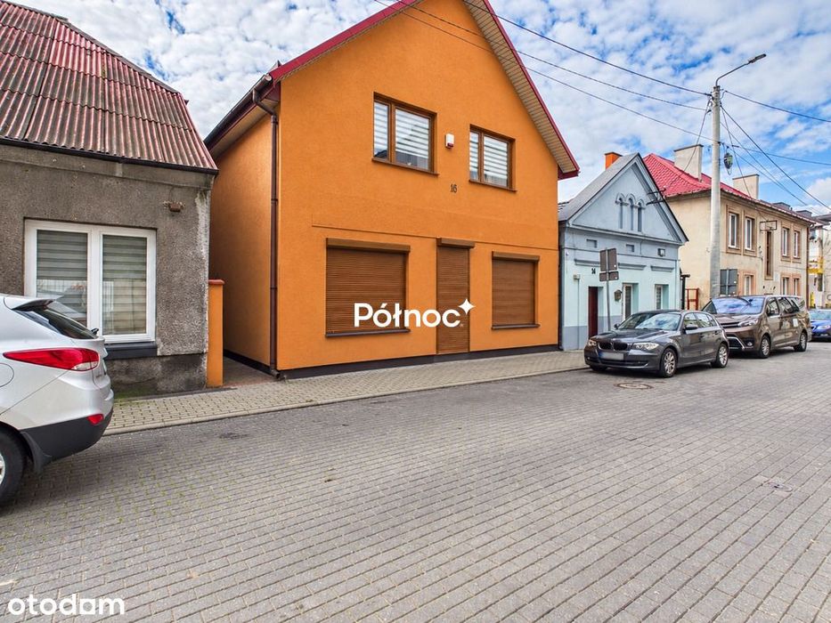 Dom z ogrodem i potencjałem w centrum Lipna .