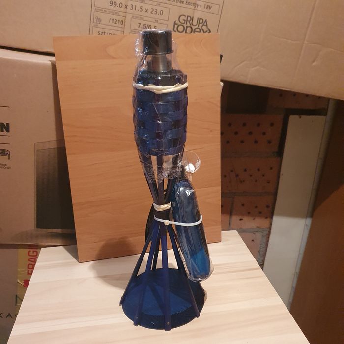 Pochodnia olejowa lampion z kolorowym płomieniem.Olej i knoty zapasowe