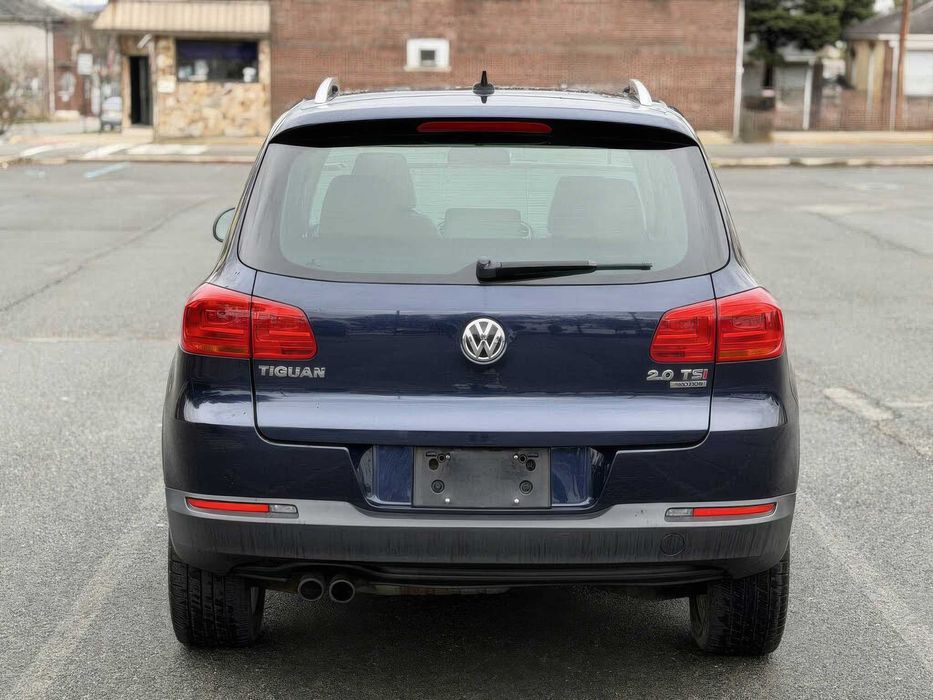 Volkswagen Tiguan 2.0      2014