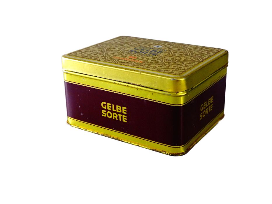 gelbe sorte stara metalowa puszka po papierosach