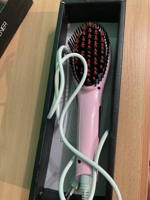 Електро гребінець.