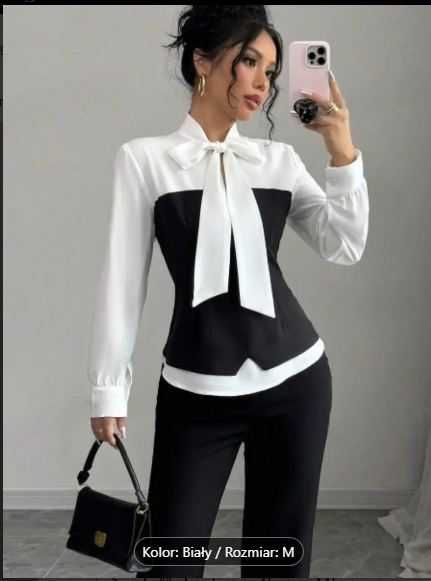 Elegancka nowa bluzka damska z wiazaniem pod szyją  R.M 38