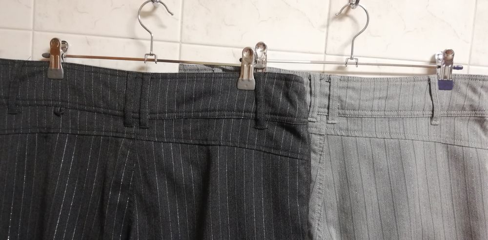Calças tecido, cinza, 38, Stradivarius, usadas 

As calças não são elá
