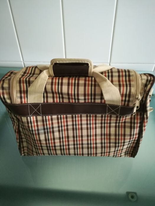 Saco de mão e tiracolo Avon