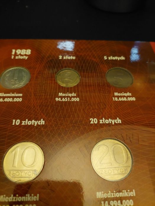 Album klaser z monetami PRL.