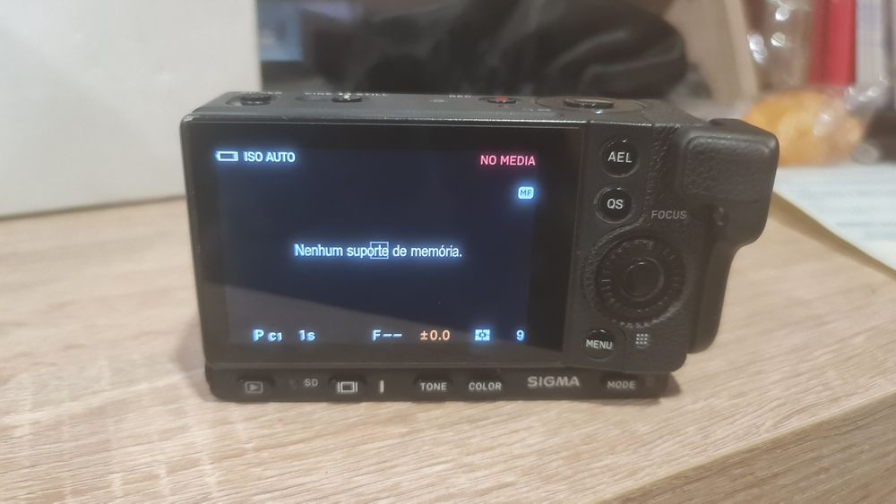 Sigma fp with 2 batteries + handgrip + hot shoe flash