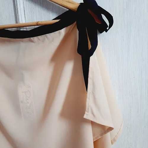 Blusa mangas esvoaçantes