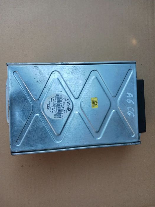 Wzmacniacz AUDI A6 C6 radio audio fabryczny 4F0035223 4F0910223B