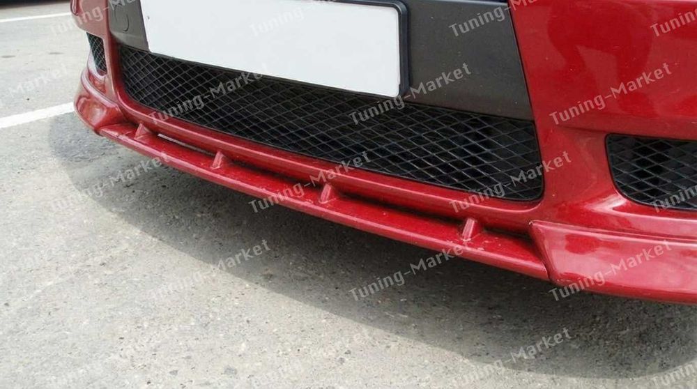 Клыки, накладки, уголки на бампер Mitsubishi Lancer X, Подиум номера, перемычка, планка Митсубиши Лансер 10