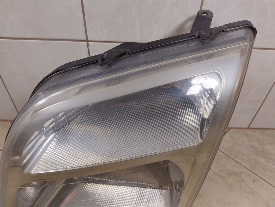 Ford connect tourneo lampa reflektor lewy przód Europa oryginał wysyłka Ford Transit Connect I (2002-2013)