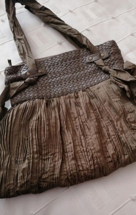 Mala vintage de tecido e pele sintética