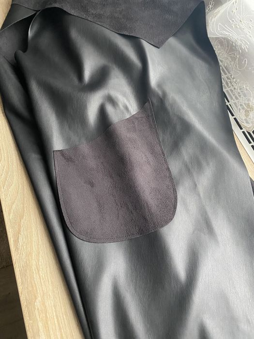 Жіноча жилетка