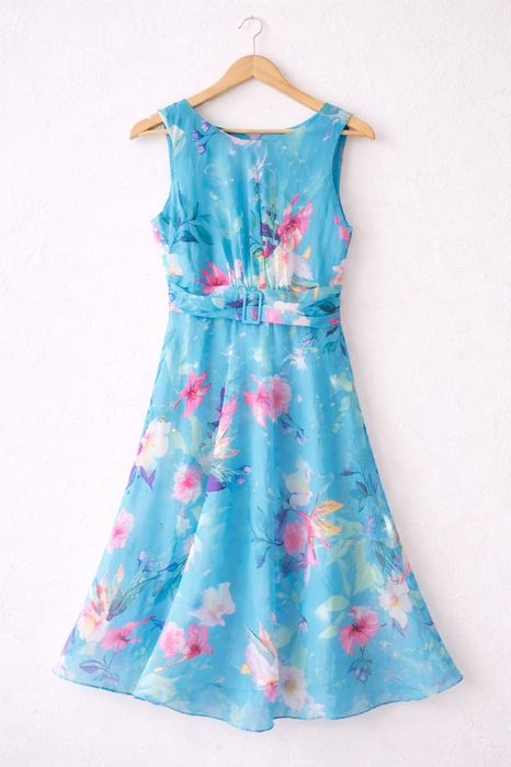 Turkusowa sukienka w kwiaty firmy Roman