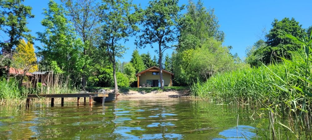 Domek z linią brzegową jeziora Dadaj, własne molo, Rukławki na wynajem