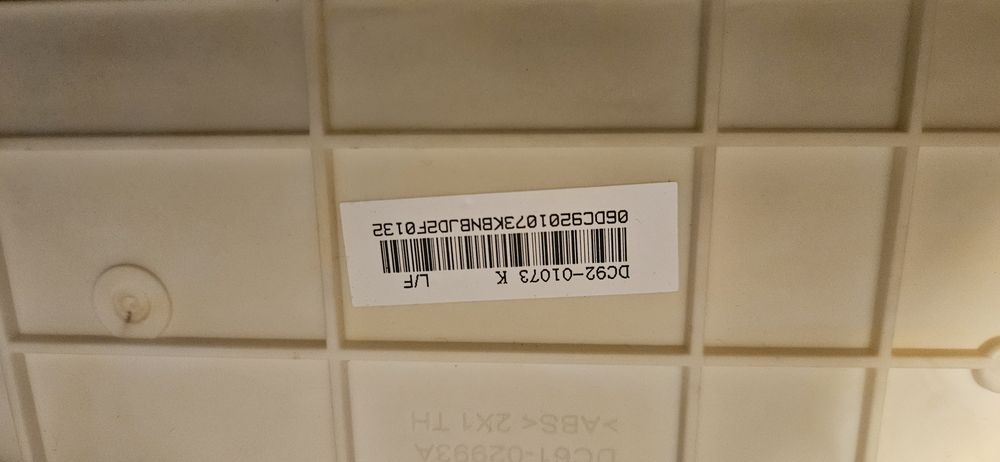 Części pralki Samsung WF600B0BKWQ szuflada i panel sterujacy.