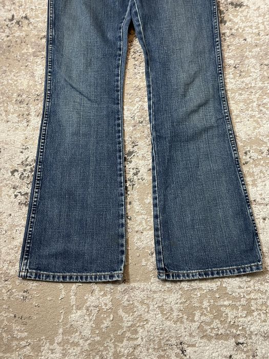 Spodnie jeansowe damskie dzwony wrangler W31L34