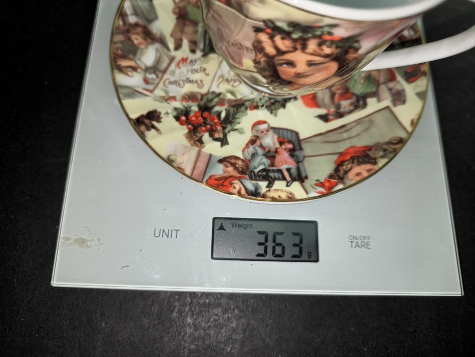 Chávena de chá em porcelana com motivos natalícios
Conjunto de chávena