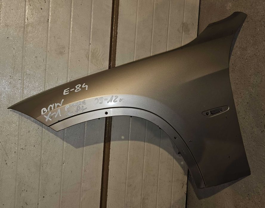 BMW X-1 X1 E84 E-84 błotnik przód przedni lewy 09-12r. przed lifting
