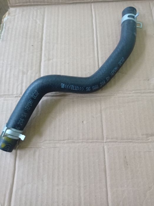 Патрубок радиатора печки подводящий 96566204 для автомобиля Дэу Матиз