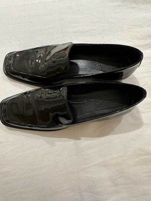 Sapatos da Máximo usados uma vez