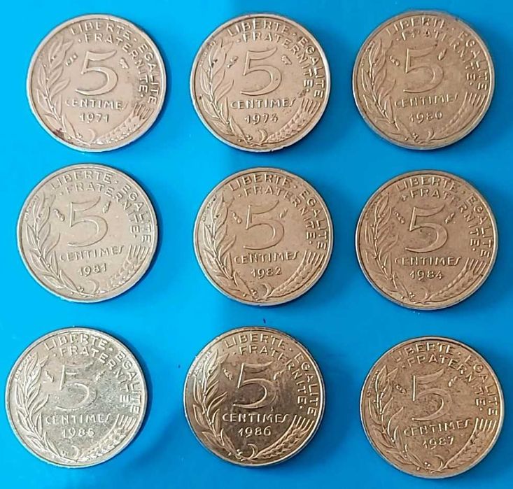 Lote 9 moedas de 5 Cêntimos de 1971/74/80/81/82/84/85/86/87, França
