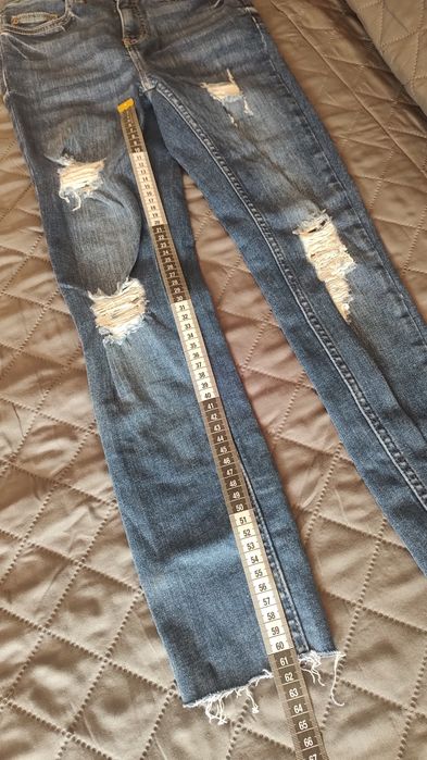 Spodnie z przetarciem DenimCo XS