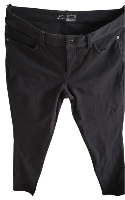 Markowe elastyczne spodnie jeans firmy Nike r 38 M czarne