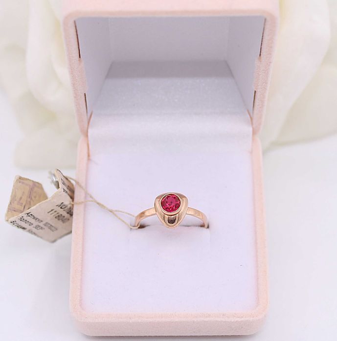 Złoty pierścionek p.585/1,77g z różowym kamieniem