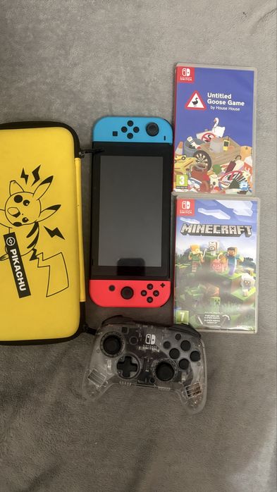 Nintendo switch com cartao 64g+2 jogos+controlo