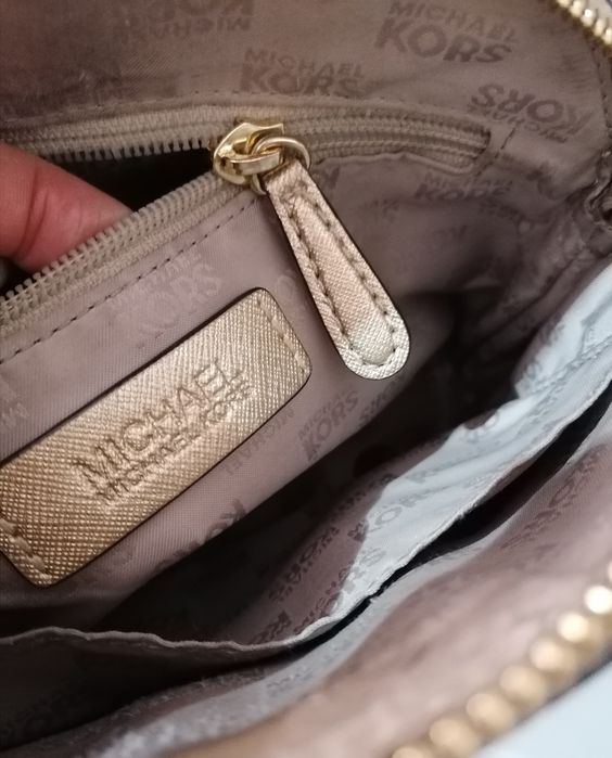 Mala Michael Kors dourada